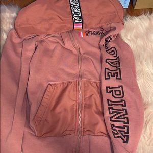 pink store sweater